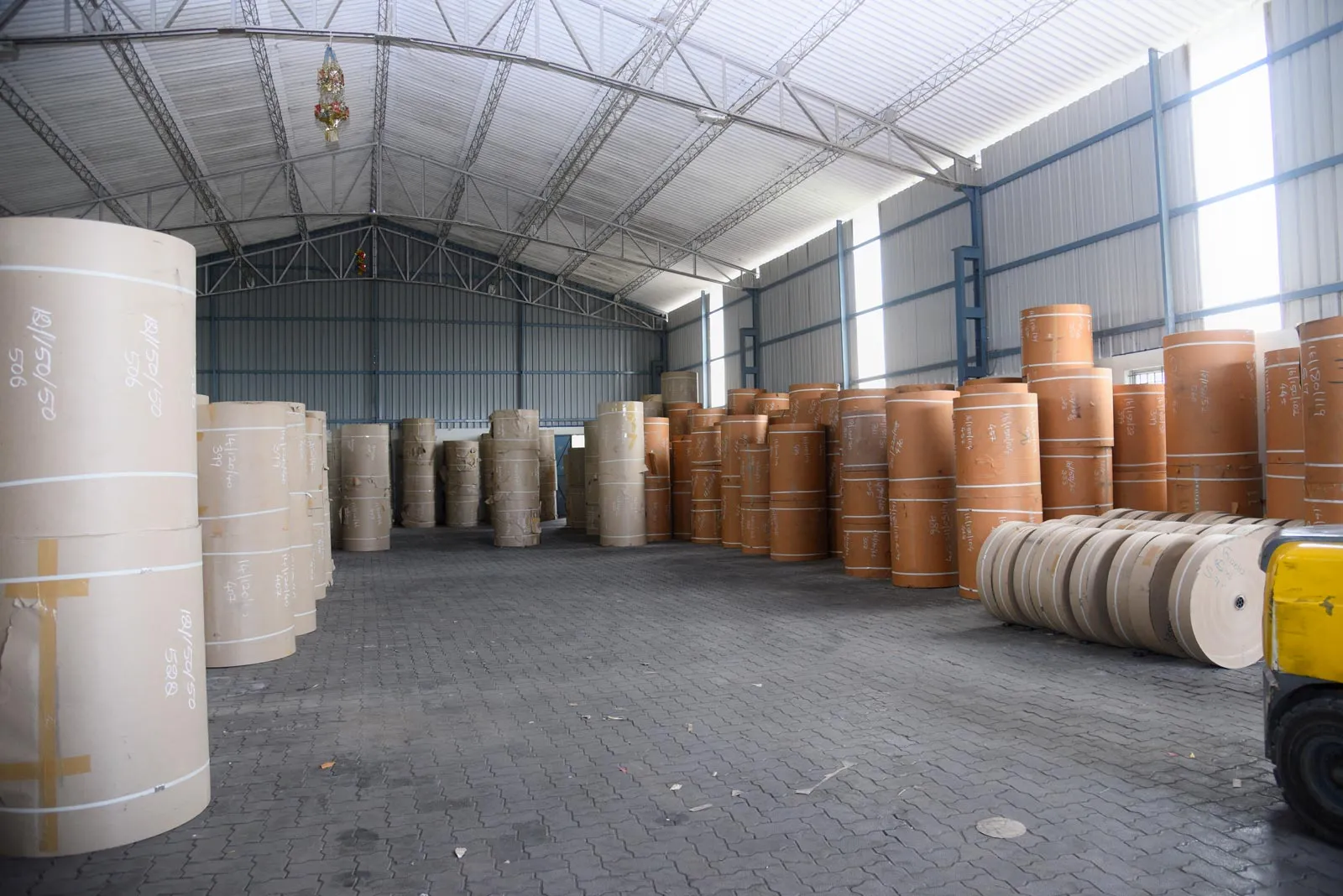 Conditioned Brown Paper Roll in Warehouse